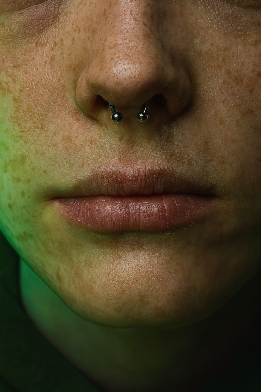 Septum piercing with a classic ring